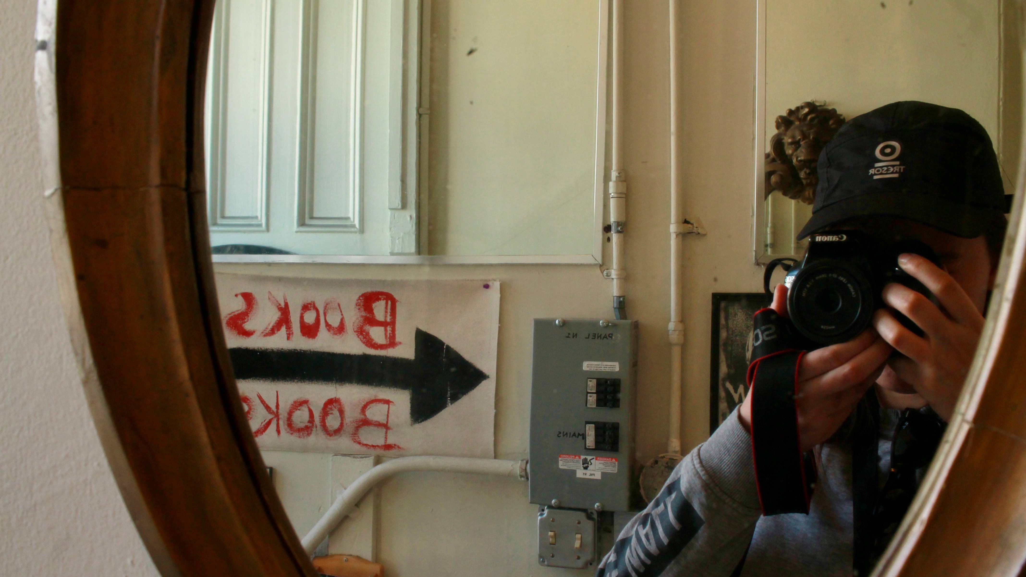 me in the City Lights library in SF